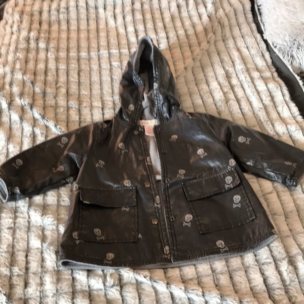 Amy Coe skull and crossbones raincoat